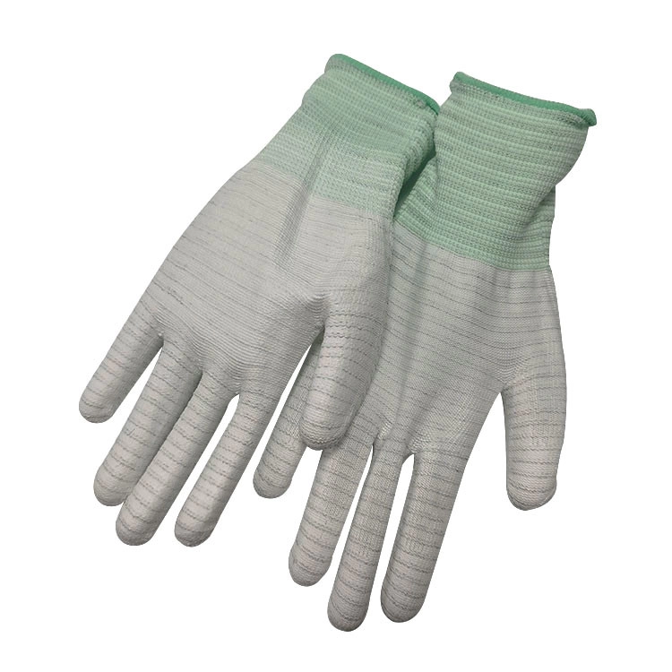 Anti-static gloves preventing static electricity in electronics industry - safeguarding RAM/IC circuits from potential damage.